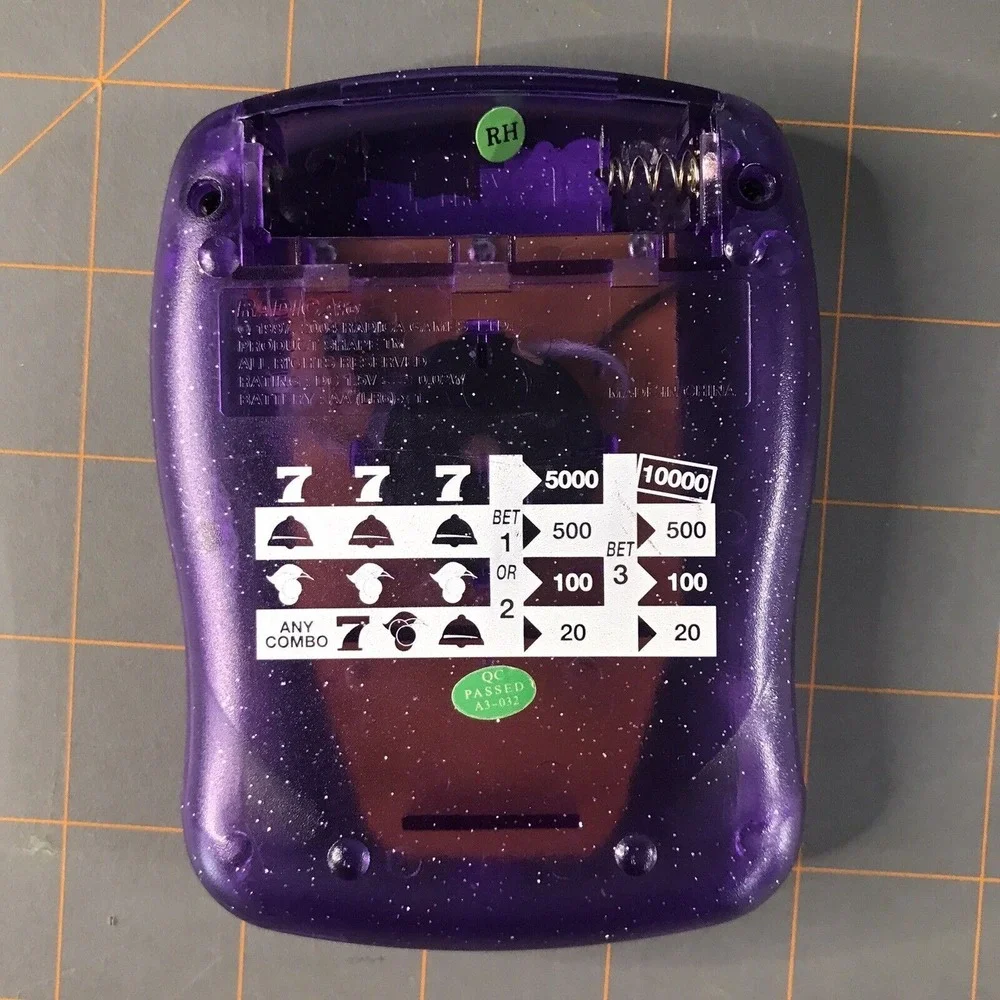 Radica 2004 Purple Pocket Electronic Handheld Game‎ Machine Game
